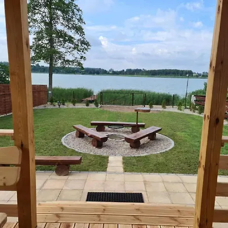 Siedlisko Nad Jeziorem Skarlinskim 5b, Mazury, Jezioro, Domek, Bania Casa de Férias Kurzetnik
