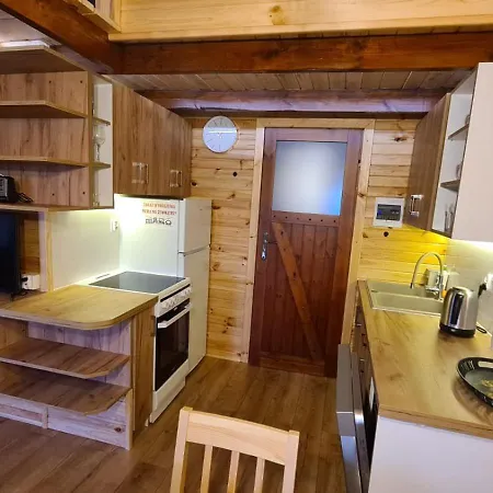 Siedlisko Nad Jeziorem Skarlinskim 5b, Mazury, Jezioro, Domek, Bania Casa de Férias