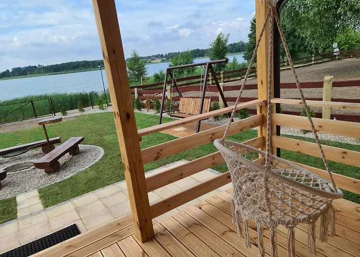Semesterbostad Siedlisko Nad Jeziorem Skarlinskim 5b, Mazury, Jezioro, Domek, Bania